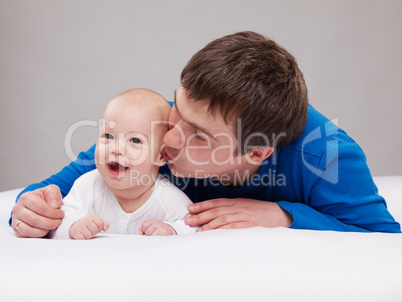 portrait of father with his baby boy