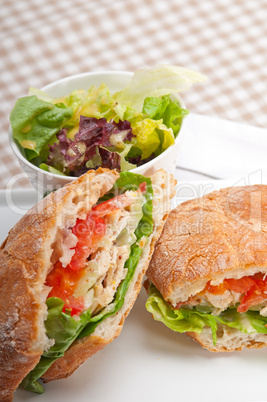 ciabatta panini sandwich with chicken and tomato