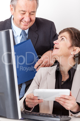 Employee shows their superiors Tablet PC