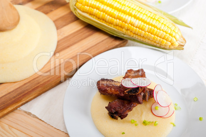 pork ribbs on polenta corn cream bed