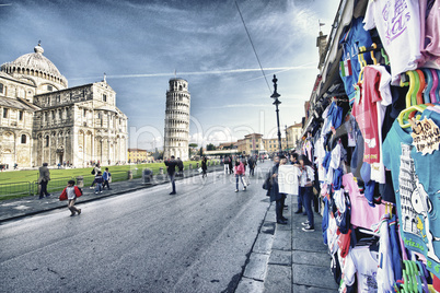 pisa, italy - nov 24: tourists walk in miracles square, november