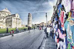 pisa, italy - nov 24: tourists walk in miracles square, november