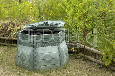 compost barrel in a garden