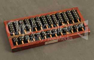 horizontal picture of an ancient Chinese abacus