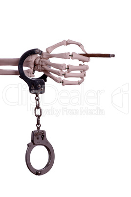 skeleton hand with handcuff holding cigar