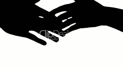 Shaking hands of two people, silhouette isolated on white.