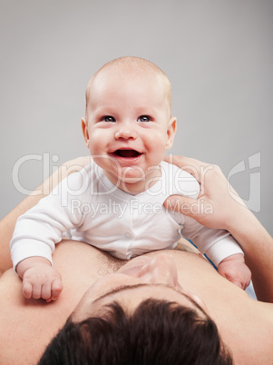 portrait of father with his baby boy