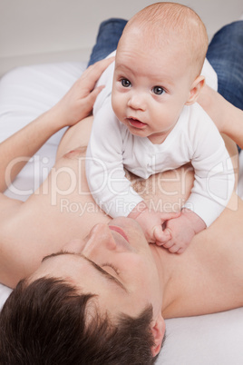 portrait of father with his baby boy