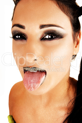 Girl showing tongue.