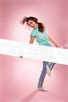 laughing girl holding a long blank banner