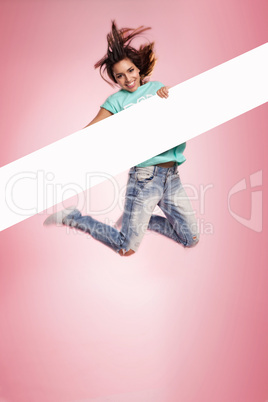 woman jumping midair with a blank banner