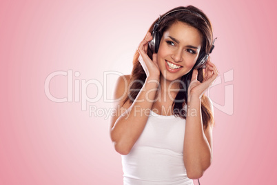 brunette woman listening to the music