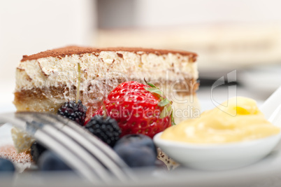 tiramisu dessert with berries and cream