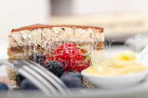 tiramisu dessert with berries and cream