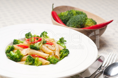 Italian penne pasta with broccoli and chili pepper