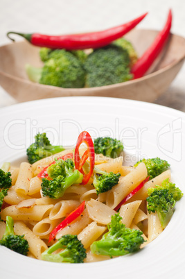 Italian penne pasta with broccoli and chili pepper
