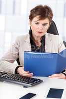 Businesswoman examination of documents