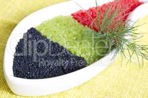 Black, green and red caviar