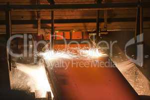 Gas cutting of the hot metal