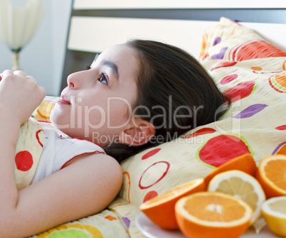 Little girl with a thermometer