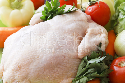 whole raw chicken with vegetables