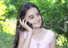 teenage girl talking on smart phone