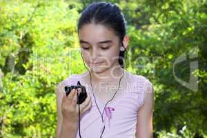 Girl listening to music on a smartphone