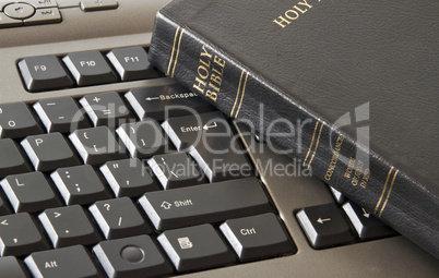 Holy Bible and keyboard