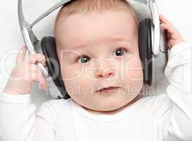 baby listening music on back