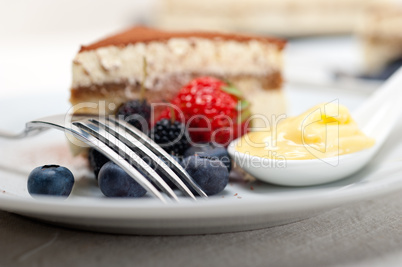 tiramisu dessert with berries and cream