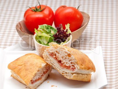 ciabatta panini sandwich with parma ham and tomato