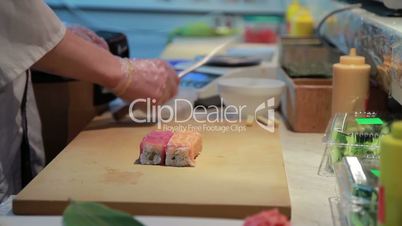 Cooking Of Salmon Sushi Roll.