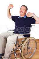 Man in wheelchair with stretching exercises