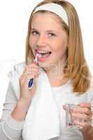 Happy teenage girl brushing teeth toothbrush dental