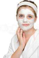 Anxious teenager girl applying face mask cleaning