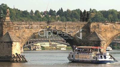 Cruise ship under the Charles Bridge,Prague,Czech Republic