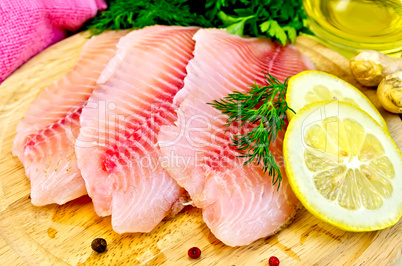 Fillets tilapia with oil and lemon