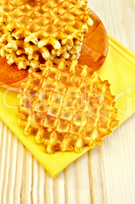 Waffles circle golden on the board