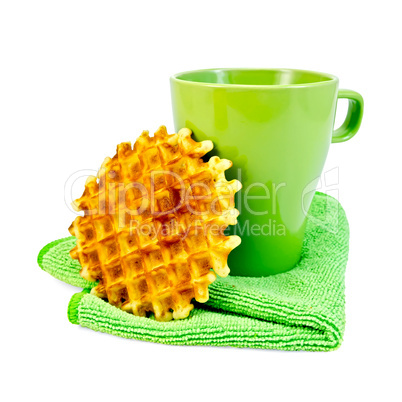 Waffles circle with a green mug