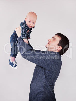 portrait of father with his baby boy