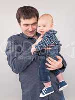 portrait of father with his baby boy