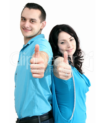 smiling couple shows thumbs-up
