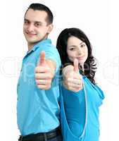 smiling couple shows thumbs-up