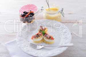 eggs with ham and black olive ones