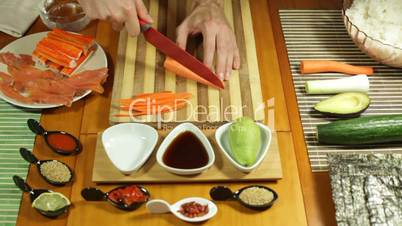 Chopping carrot for Sushi roll