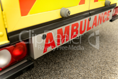 Ambulance car from behind sign