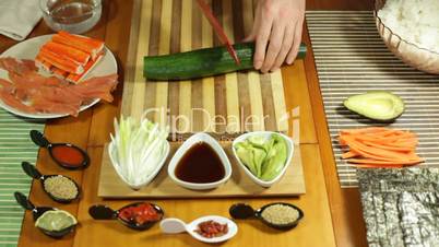 Chopping cucumber for Sushi roll