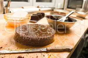 Chocolate cake with jam in the kitchen