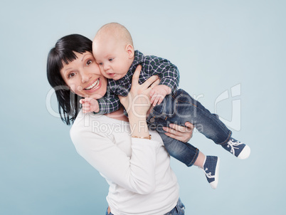 portrait of mother with her baby boy