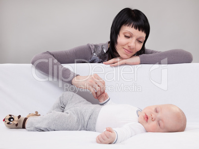 portrait of mother with her baby boy